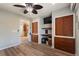 Den with built-in cabinets, drawers, and desk at 561 Meandering Way, Polk City, FL 33868