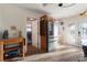 Kitchen with stainless steel appliances and oak cabinets at 561 Meandering Way, Polk City, FL 33868