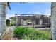 Spacious screened patio with grill, perfect for outdoor entertaining at 561 Meandering Way, Polk City, FL 33868