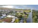 Single story home located on a canal near the lake at 6029 Avocado Dr, Indian Lake Estates, FL 33855