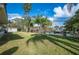 Expansive backyard with canal views at 6029 Avocado Dr, Indian Lake Estates, FL 33855