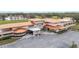 Community clubhouse with parking area at 6029 Avocado Dr, Indian Lake Estates, FL 33855