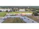 An aerial view of a community clubhouse with parking at 6029 Avocado Dr, Indian Lake Estates, FL 33855
