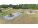 Community playground with playsets and slides at 6029 Avocado Dr, Indian Lake Estates, FL 33855