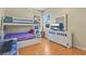 bedroom featuring bunk beds and ample storage at 6818 Hayter Drive, Lakeland, FL 33813