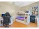 ' bedroom with bunk beds and a study area at 6818 Hayter Drive, Lakeland, FL 33813