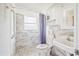 Updated bathroom with walk-in shower and modern vanity at 1568 S Lake Shipp Dr, Winter Haven, FL 33880