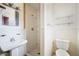 Bathroom with shower and toilet at 1568 S Lake Shipp Dr, Winter Haven, FL 33880