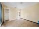 Bright bedroom with closet and access to hallway at 1568 S Lake Shipp Dr, Winter Haven, FL 33880