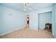 Bedroom with access to another room and closet at 1568 S Lake Shipp Dr, Winter Haven, FL 33880