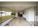 Covered carport area with access to the house at 1568 S Lake Shipp Dr, Winter Haven, FL 33880