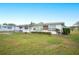 House exterior showcasing a large yard at 1568 S Lake Shipp Dr, Winter Haven, FL 33880