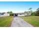 Front view of ranch home with carport at 1568 S Lake Shipp Dr, Winter Haven, FL 33880