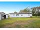 House exterior with shed and grassy yard at 1568 S Lake Shipp Dr, Winter Haven, FL 33880