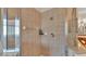 Large shower with tile surround and built-in shelf at 240 Burford Cir, Davenport, FL 33896