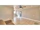 Living room with tile floors and chandelier at 42 Queens Ct, Frostproof, FL 33843