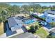 Aerial view of house, pool, and lake at 425 E Belmar St, Lakeland, FL 33803