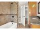Bathroom with tile shower, tub and granite countertop at 425 E Belmar St, Lakeland, FL 33803
