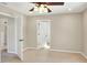Spacious bedroom with ceiling fan and neutral walls at 425 E Belmar St, Lakeland, FL 33803