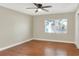 Bright bedroom with hardwood floors and window at 425 E Belmar St, Lakeland, FL 33803