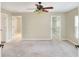 Large bedroom with ceiling fan and walk-in closet at 425 E Belmar St, Lakeland, FL 33803