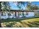 Updated home exterior with a modern look and landscaping at 425 E Belmar St, Lakeland, FL 33803
