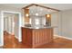 Updated kitchen with wood cabinets and granite counters at 425 E Belmar St, Lakeland, FL 33803