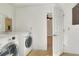 Laundry room with washer, dryer, and access to other rooms at 425 E Belmar St, Lakeland, FL 33803