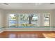 Bright living room with hardwood floors and large windows at 425 E Belmar St, Lakeland, FL 33803