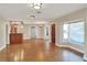 Open concept living and kitchen area with hardwood floors at 425 E Belmar St, Lakeland, FL 33803