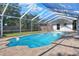 Sparkling screened pool, perfect for relaxation and enjoyment at 425 E Belmar St, Lakeland, FL 33803