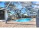 Inviting screened pool with brick pavers and a large enclosure at 425 E Belmar St, Lakeland, FL 33803