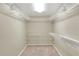 Large walk-in closet with wire shelving for storage at 425 E Belmar St, Lakeland, FL 33803