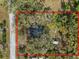 Aerial view highlighting the property lines of the home and surrounding trees at 4925 Magnolia Ave, Mulberry, FL 33860