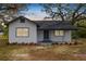 Charming renovated home with a newly painted exterior and landscaping at 4925 Magnolia Ave, Mulberry, FL 33860