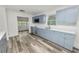 Modern kitchen featuring light blue cabinetry, quartz countertops, and stainless steel appliances at 4925 Magnolia Ave, Mulberry, FL 33860