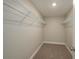 Large walk-in closet with wire shelving for ample storage at 5435 Carmen Ln, Lakeland, FL 33810