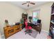 Home office with lake view and built-in shelving at 5548 Huron Way, Lakeland, FL 33805