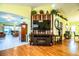 Living room with hardwood floors, fireplace, and built-in entertainment center at 7116 Lake Eaglebrooke Way, Lakeland, FL 33813