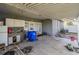 Covered patio with exterior kitchen and a blue recycling bin at 806 Lafayette Ln, Lakeland, FL 33805