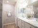 Spa-like bathroom with double vanity and shower at 1839 Daystar Dr, Haines City, FL 33844