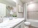 Clean bathroom with a bathtub and marble vanity at 1839 Daystar Dr, Haines City, FL 33844
