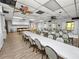 Community room with long tables perfect for meetings at 2055 S Floral Ave # 146, Bartow, FL 33830