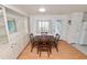 Bright dining area with built-in cabinetry and wood flooring at 2055 S Floral Ave # 146, Bartow, FL 33830