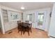 Bright dining area with built-in cabinetry and wood flooring at 2055 S Floral Ave # 146, Bartow, FL 33830