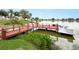 Community dock on the lake with a view of waterfront homes at 2055 S Floral Ave # 146, Bartow, FL 33830