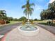 Community entrance with a welcoming fountain at 2055 S Floral Ave # 146, Bartow, FL 33830
