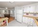 Simple kitchen with white cabinets at 2055 S Floral Ave # 146, Bartow, FL 33830