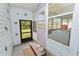 Screened porch entrance with decorative accents at 2055 S Floral Ave # 146, Bartow, FL 33830