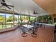 Relaxing screened porch with patio furniture and pool view at 2055 S Floral Ave # 146, Bartow, FL 33830